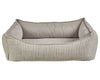 The augusta ticking color scoop dog bed from bowsers. The front panel has a scoop. It's cream with thin green stripes
