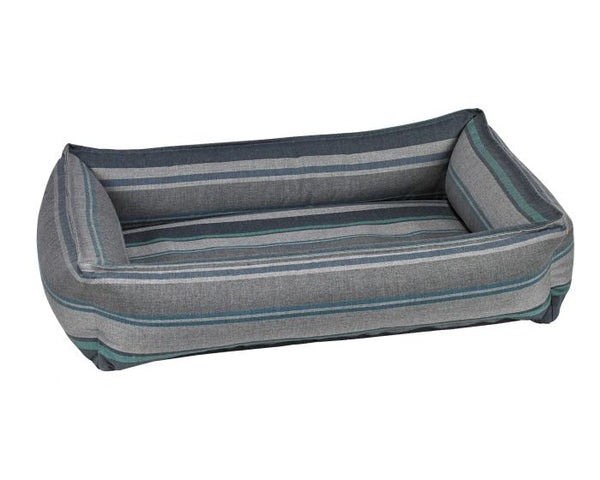The bowsers urban lounger. This the poolside edition has gray and teal stripes. It's an outdoor dog bed