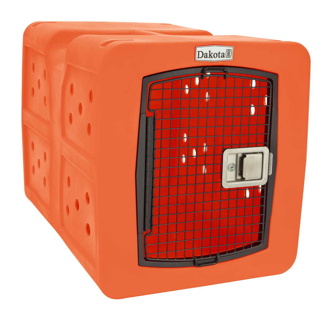 The orange dakota dog kennel is a bright orange. The material is a hard plastic. The door is a metal and the color is black. The latch is a shiny silver.