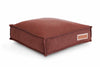 The Russet Rover Houndry lounger bed is russet red color with a slight burgundy. The fabric has a subtle linen texture.